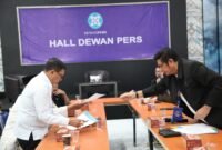 POTRET: calon Ketua Umum PWI Pusat, Hendry Ch Bangun saat verifikasi berkas pendaftaran. (Foto: Istimewa).